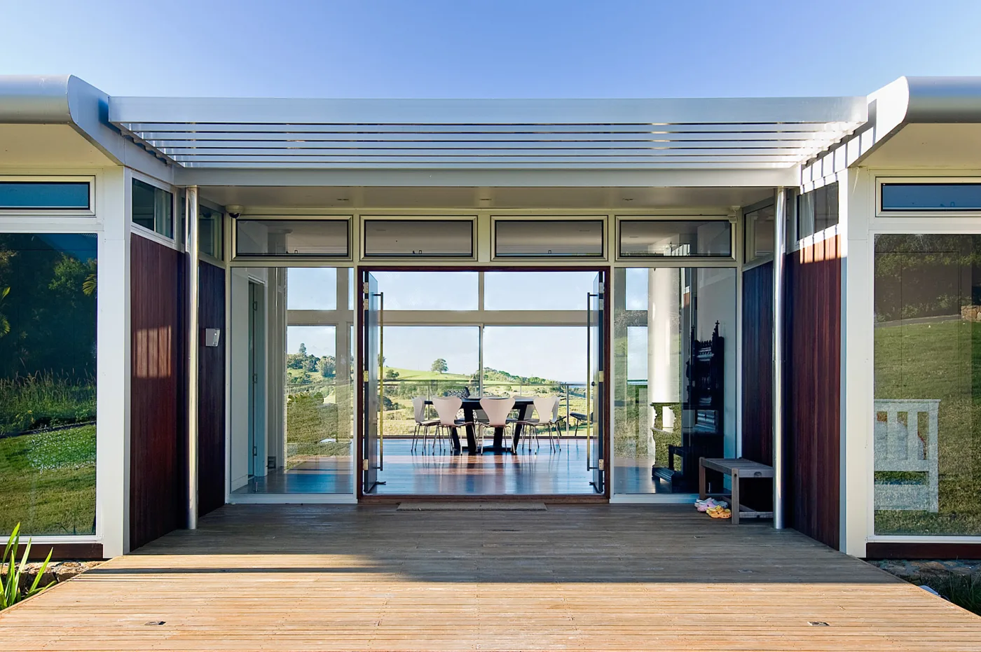 Open-plan living opening to a rural outlook